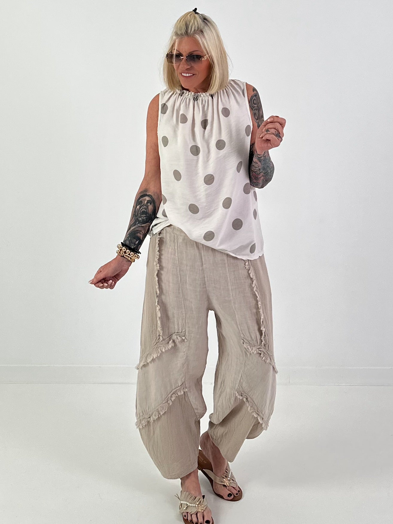 Polka dot top with ruffled collar - beige-taupe