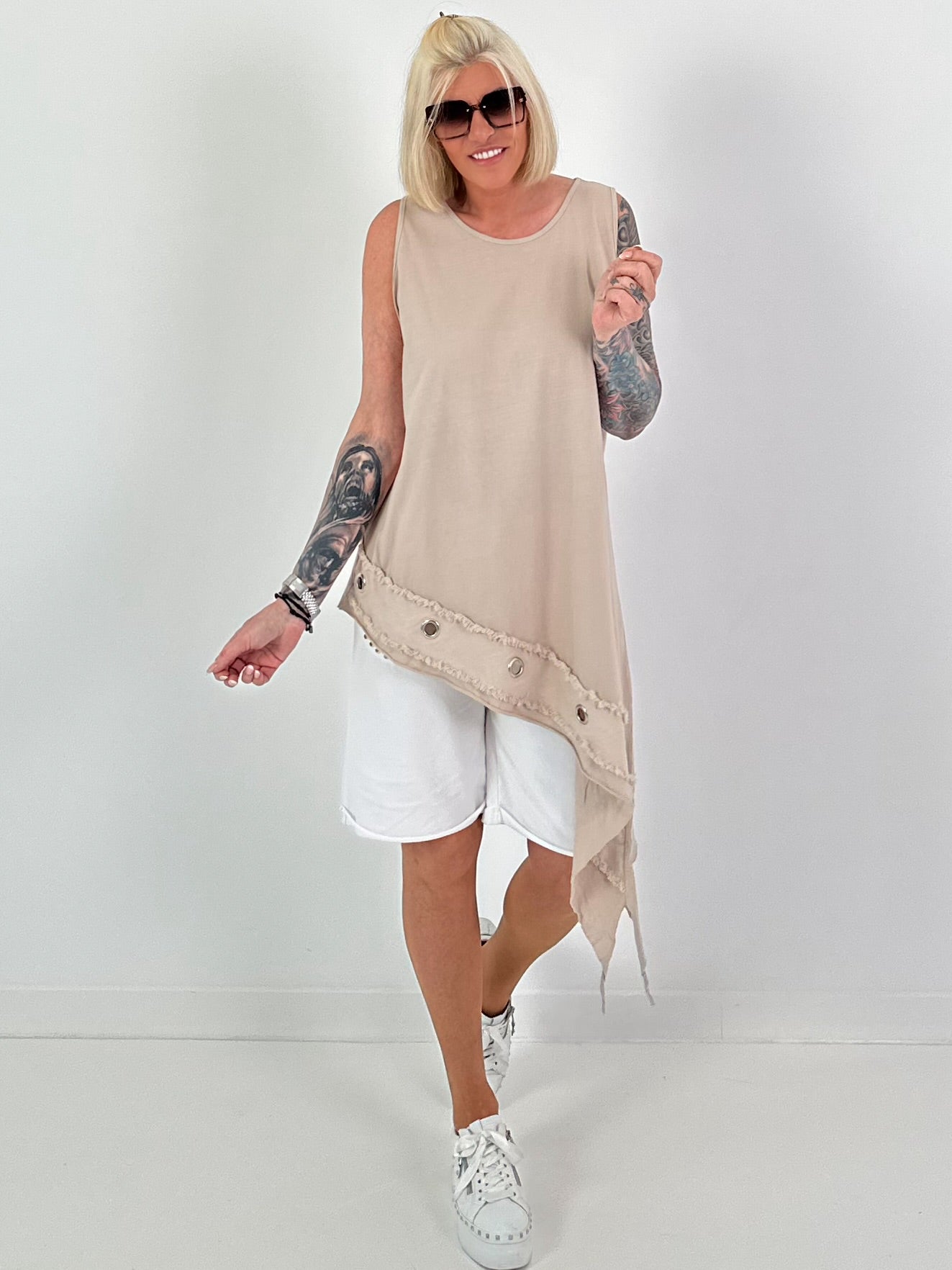 Asymmetric long top with eyelets - beige