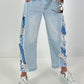 Jeans with floral crochet inserts at the sides - denim