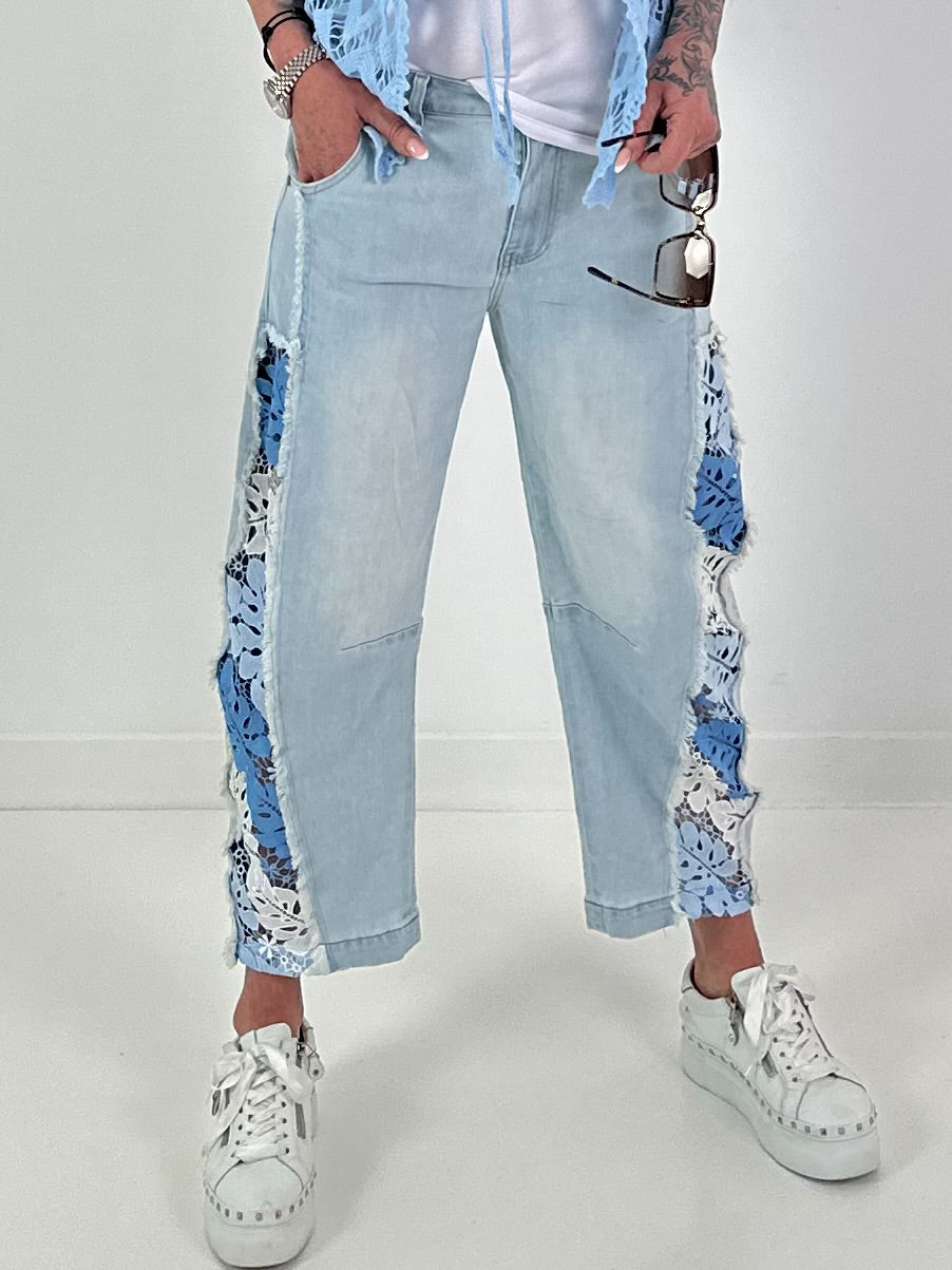 Jeans with floral crochet inserts at the sides - denim