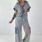 Ausgefallener Zweiteiler mit aufwendigen Denim Details- grau