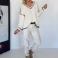 Kuscheliger Pullover mit V-Ausschnitt - ecru-chocolate