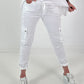 Trousers with crocheted flowers and patch pockets - white