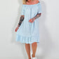 Light blue dress with short sleeves and flounce