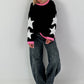 Sweatshirt mit trendigen Sternelementen- schwarz