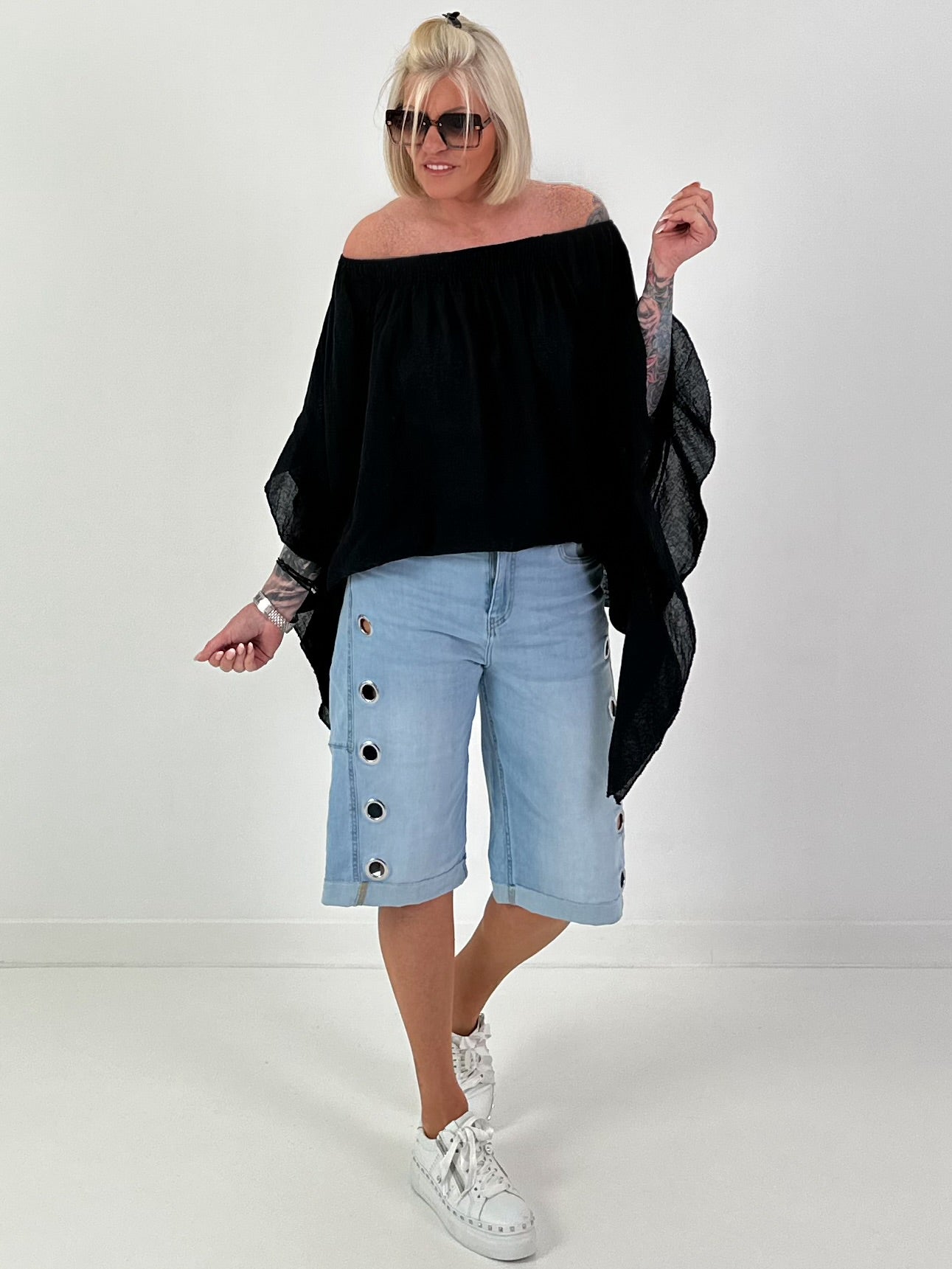 Tunic with side ruffles - black