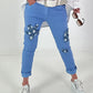Light blue jeans with denim and sequin details