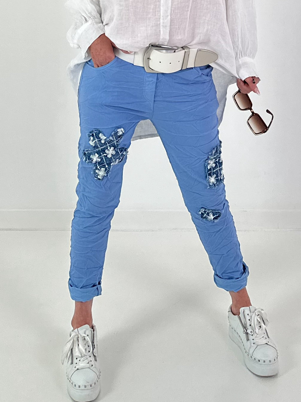 Light blue jeans with denim and sequin details