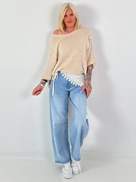 Oversized Strickpulli mit kurzen Ärmeln und Außennähten - beige