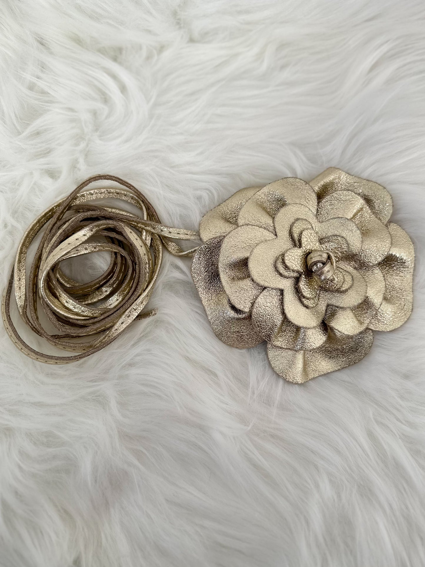 Strikceintuur model "Floral Flow" - goud