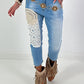 Jeans mit aufgesetzten Häkelornamenten - denim