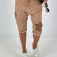 Short baggy shorts with crocheted flowers and sequins - camel