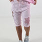 Short baggy shorts with crocheted flowers and sequins - pink