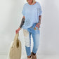Linen shirt with crocheted floral appliqués - light blue