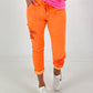 Trousers with crochet flowers - neon orange