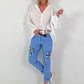 Light blue jeans with denim and sequin details