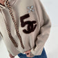 Hoodie mit Leo Bändchen und Teddyplüsch Print - beige
