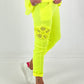 Pants with crocheted flowers - neon yellow