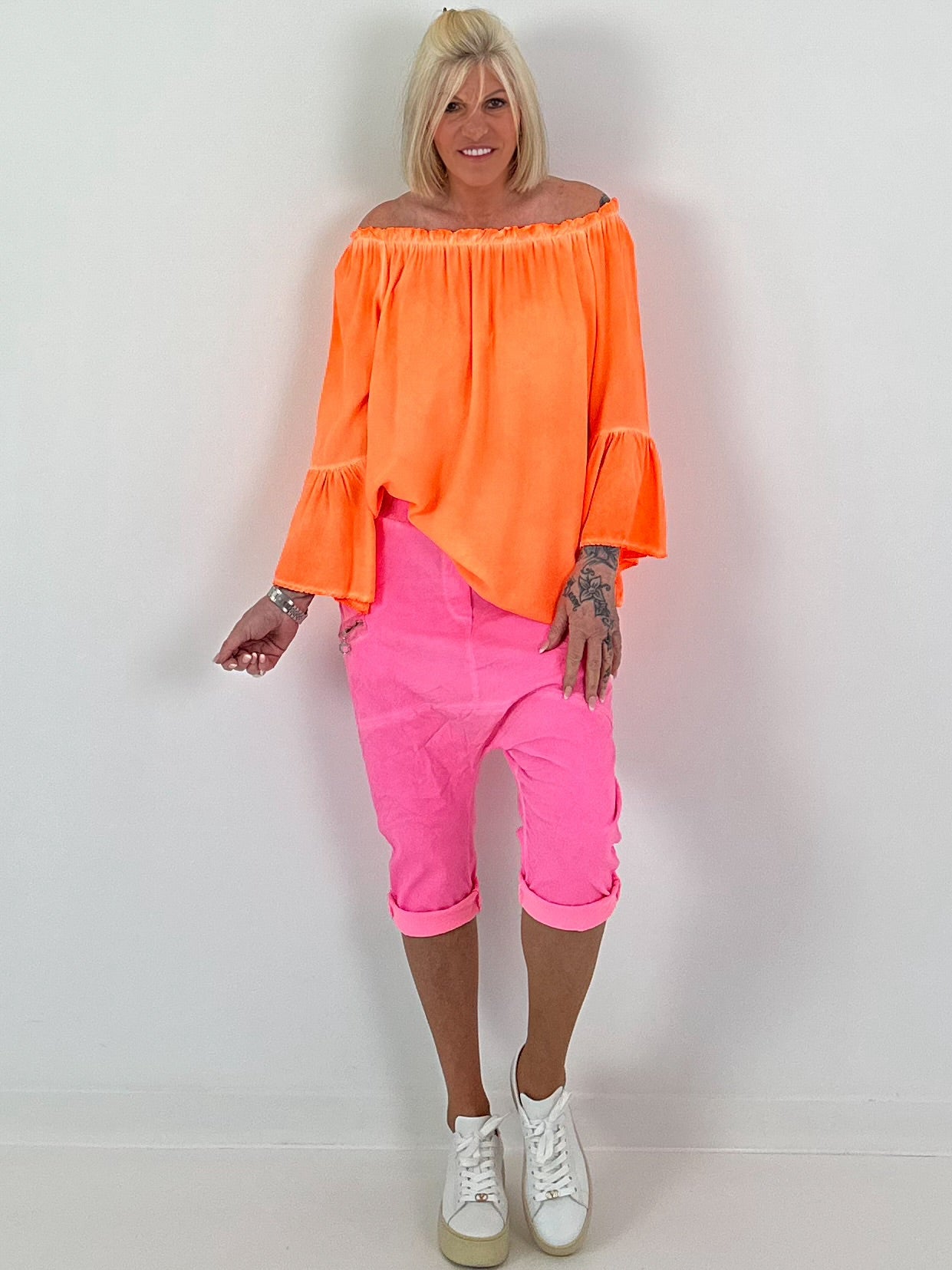 Tunic with gathered round neck and flounce sleeves - neon orange