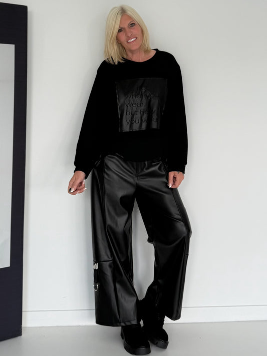 Sweater with faux leather elements - black