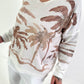 Fijn gebreide trui model "Palm Whisper" - wit-beige
