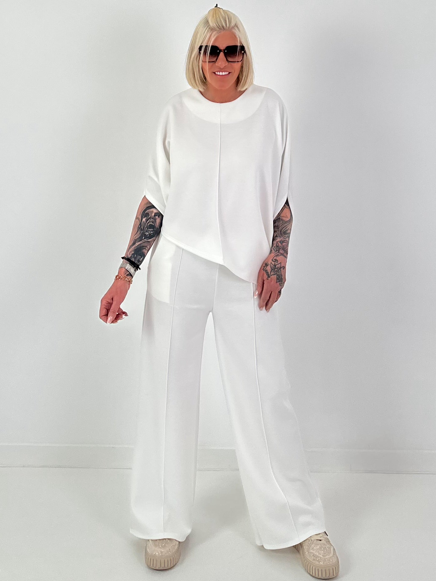 Two-piece set with asymmetrical shirt - white