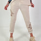 Trousers with crocheted flower inserts - beige