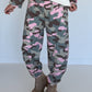 Sweatpants with camouflage print - olive multi-colored