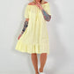 Kleid mit kurzen Ärmeln und Volant - gelb