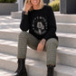 Pullover mit Strass-Comic-Motiv - schwarz