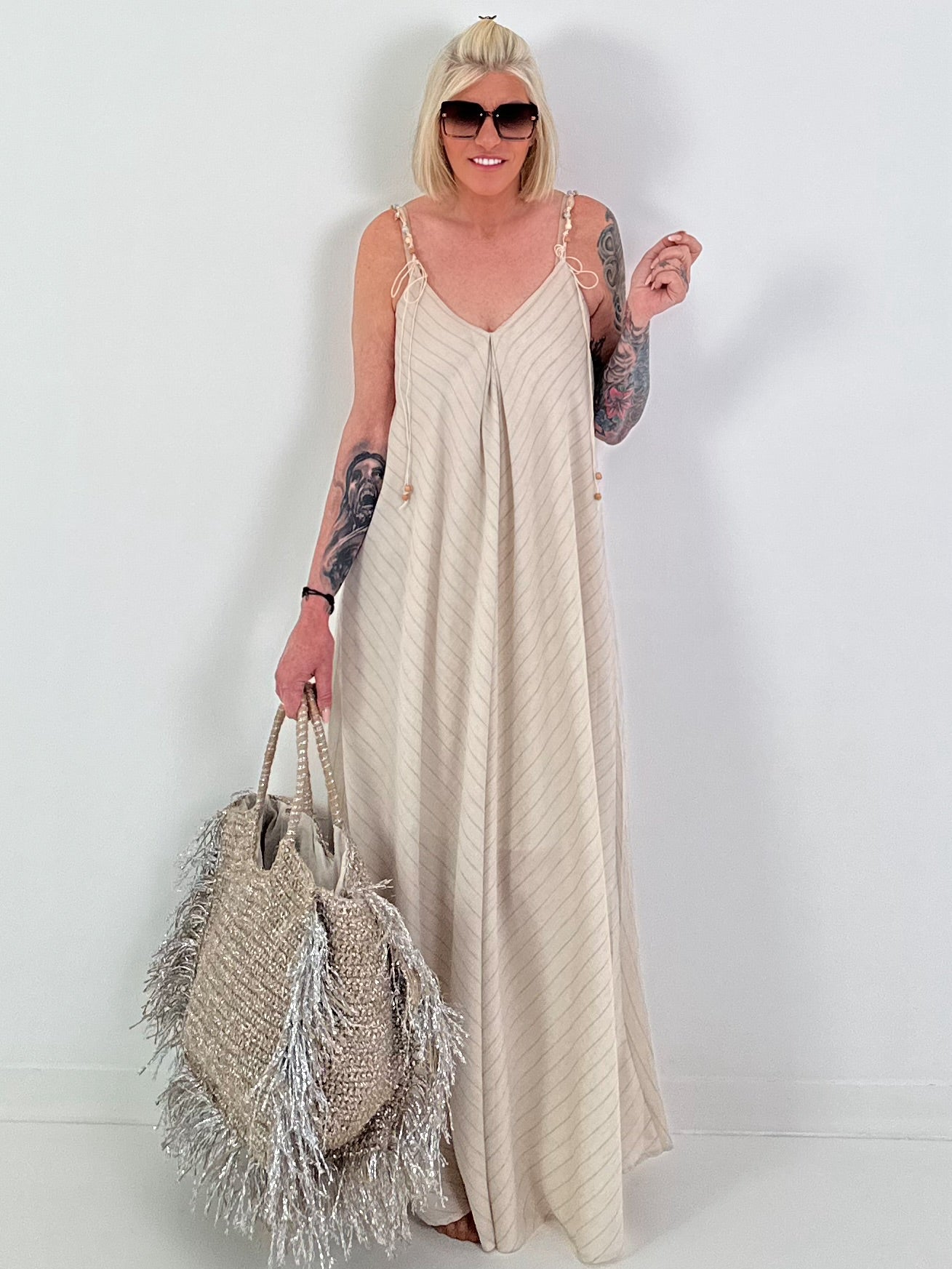 Dress with decorative straps and stripe pattern - beige