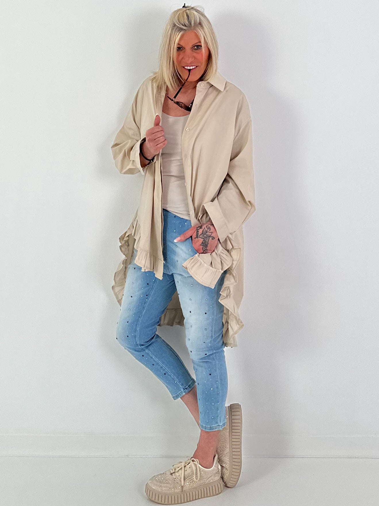 Oversized blouse met ruches – beige