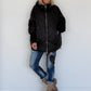 Oversized Steppjacke mit Stulpenärmeln und Kapuze - schwarz