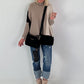 Oversized fijngebreide trui met stulpzakken – beige-taupe-zwart