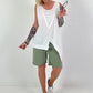 Top with cut-out and asymmetrical hem - white
