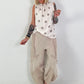 Polka dot top with ruffled collar - beige-taupe