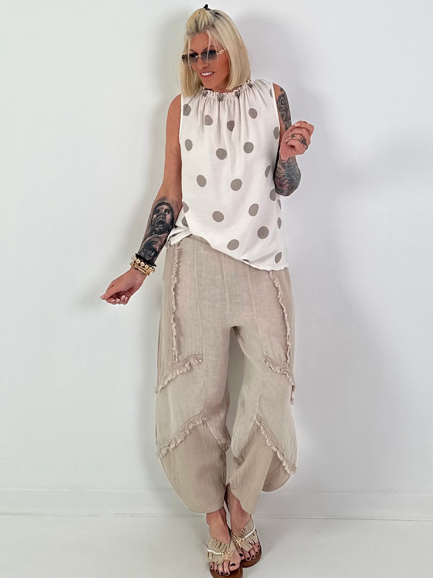 Polka dot top with ruffled collar - beige-taupe