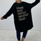 Oversized Shirt mit Statement Spruch auf dem Rücken - schwarz