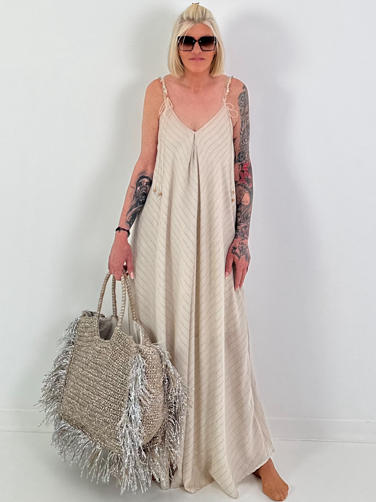 Dress with decorative straps and stripe pattern - beige