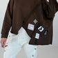 Sweater mit asymmetrischem Schnitt und Patches - mokka