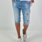 Short jeans with metal eyelets - denim
