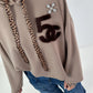 Hoodie mit Leo Bändchen und Teddyplüsch Print - taupe