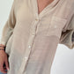 Bluse mit Pailletten und Häkel Details - beige