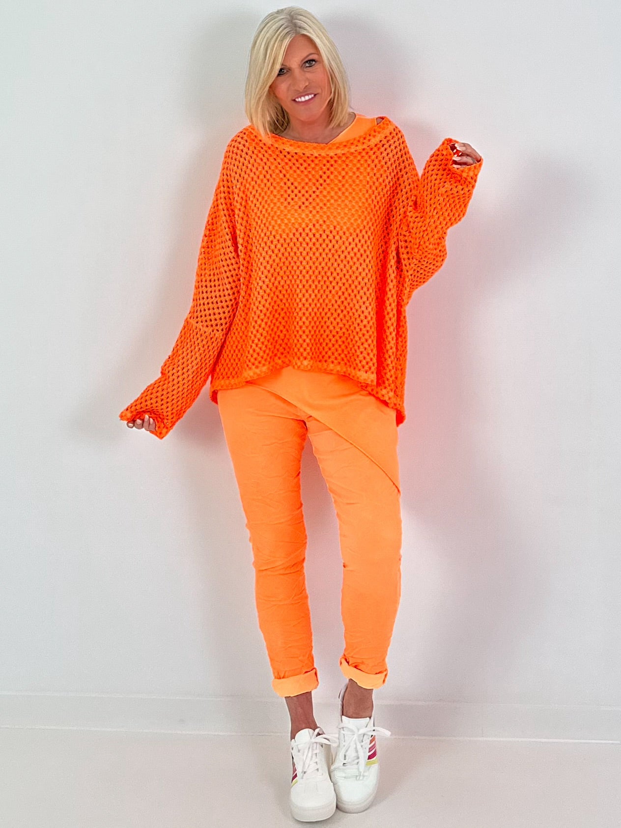 Crochet sweater with back cut-out - neon orange