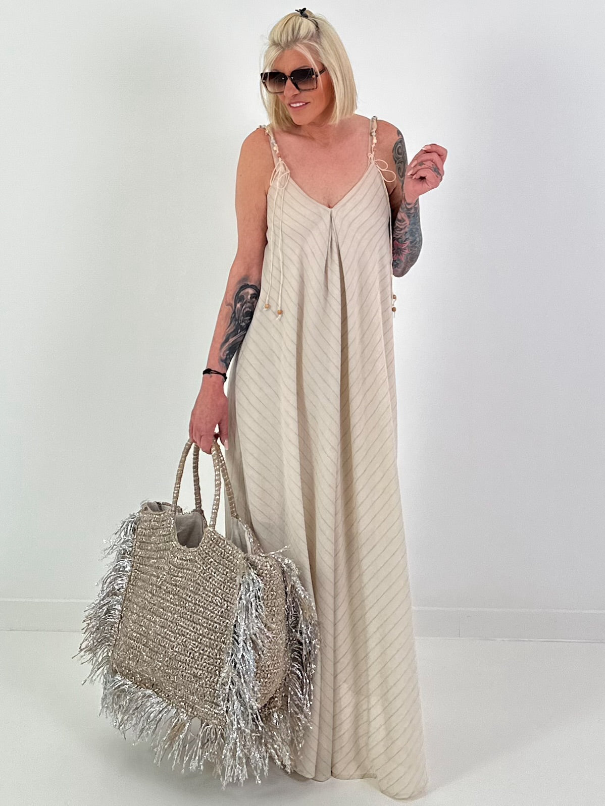 Dress with decorative straps and stripe pattern - beige