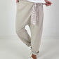 Baggy pants with decorative scarf - beige