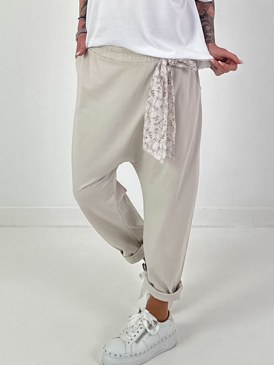Baggy pants with decorative scarf - beige
