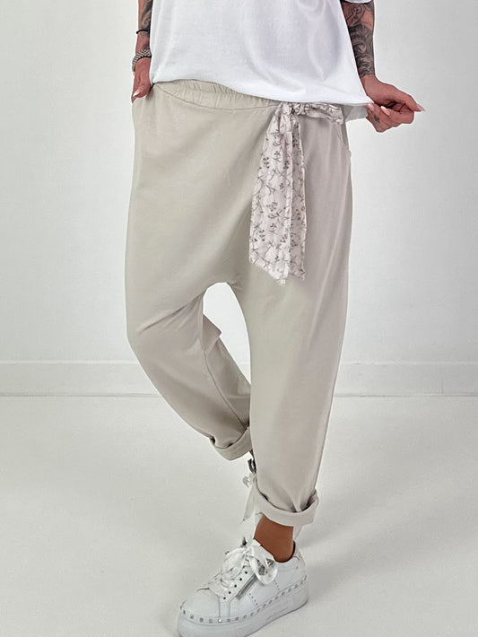 Baggy pants with decorative scarf - beige
