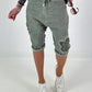 Short baggy shorts with crocheted flowers and sequins - khaki