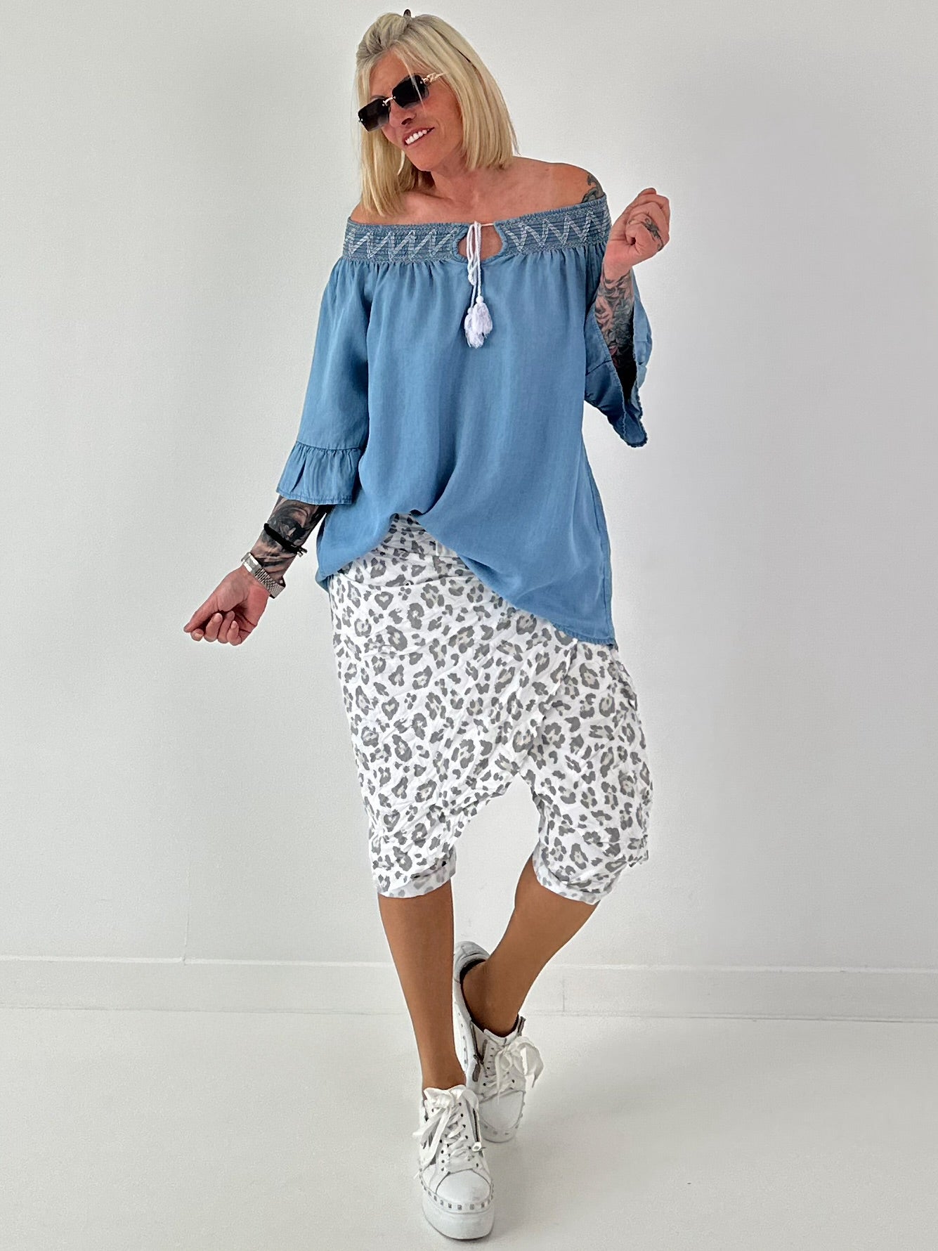 Stylische Hose mit Überwurf im Knit-Look - weiss